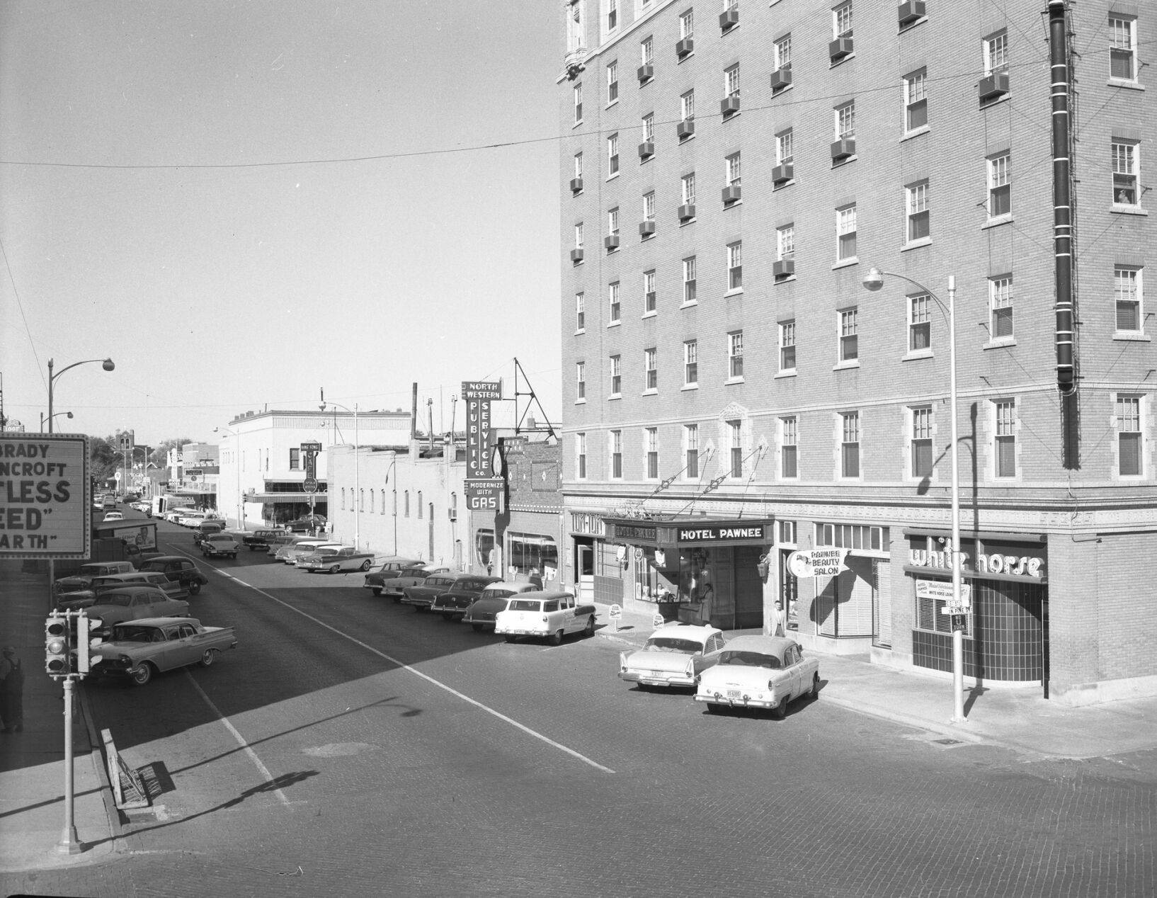 Hotel Pawnee's Tom-Tom Coffee Shop sign uncovered